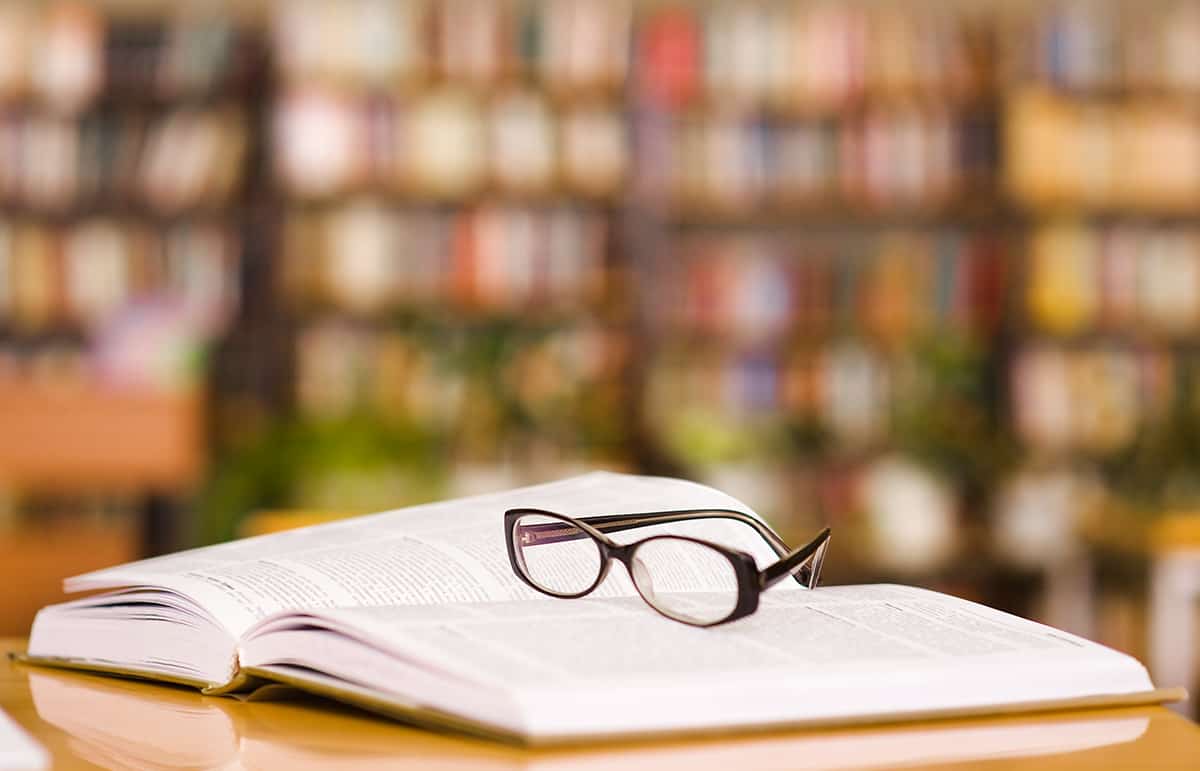 Glasses on book